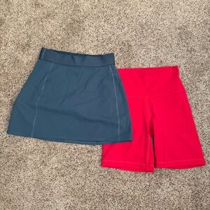 LOT (2) Aritzia TNA Slick Court Tennis Mini Skirt Navy TNA Biker Shorts Pink  XS